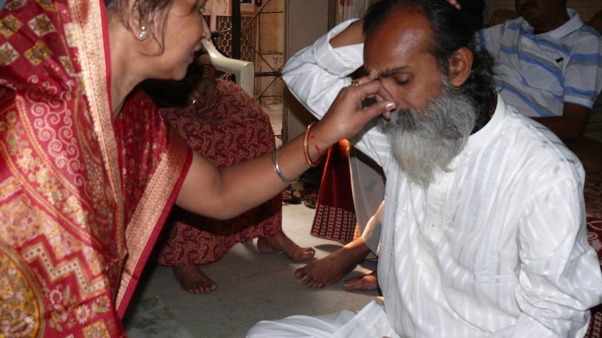 Sister applying tilak on her brother's forehead during the Bhai Dooj ritual
