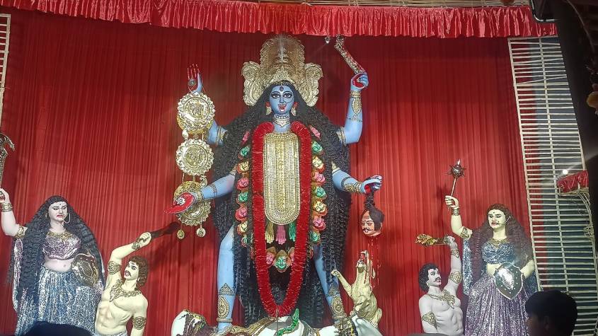 Kali idol inside a decorated Kali Puja pandal in Kolkata